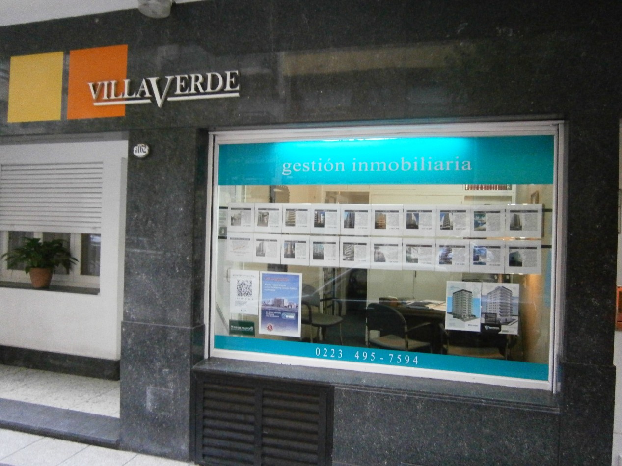 Oficina con vivienda